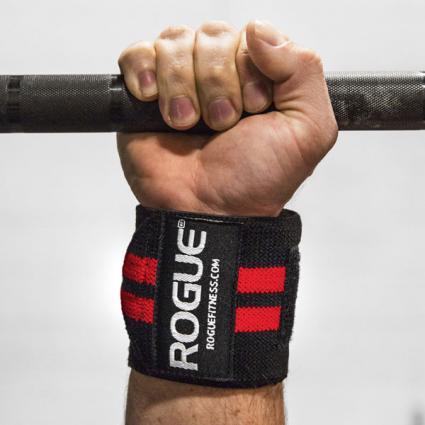 Man gripping bar to showcase Rogue Wrist Wraps - White Series in Black with Red Stripes